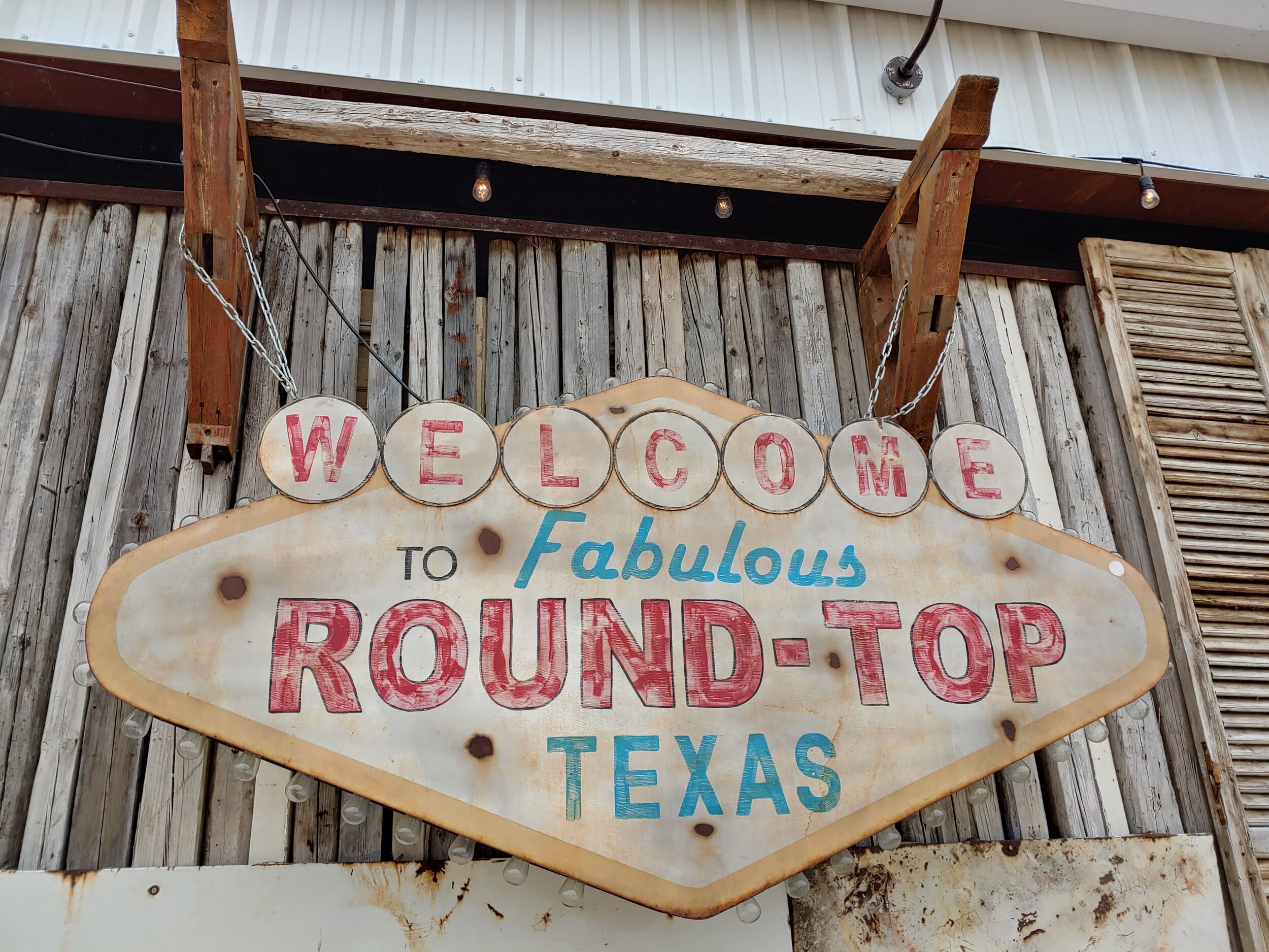 round top sign